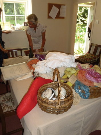 Stitching table at The Weald and Downland Museum. Visit autumn 2012.: 